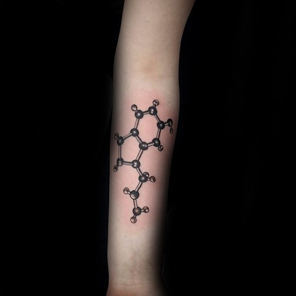 Black ink forearm tattoo of chemistry chain