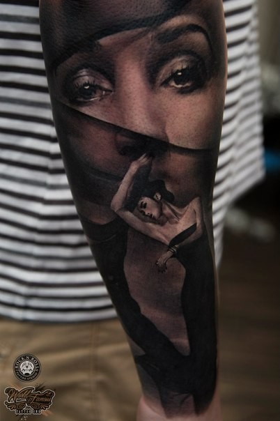 Black ink forearm tattoo of mystical woman face