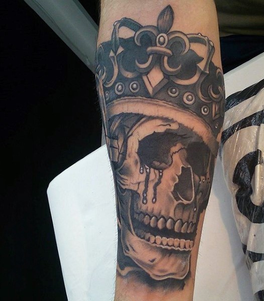 Black ink forearm tattoo of skeleton king