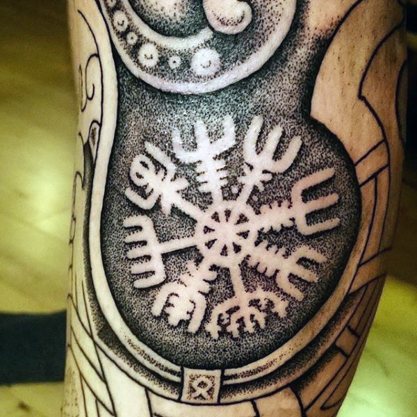 Black ink great looking stippling style tattoo on ancient ornaments