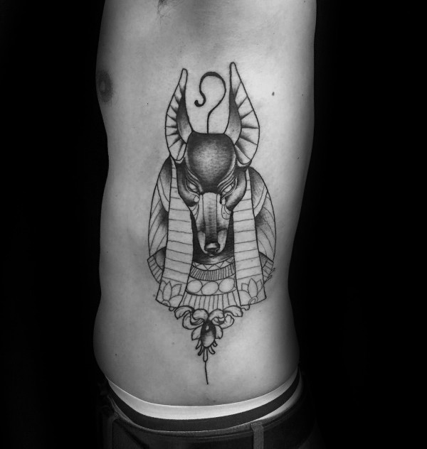 Black ink homemade style side tattoo of Anubis God