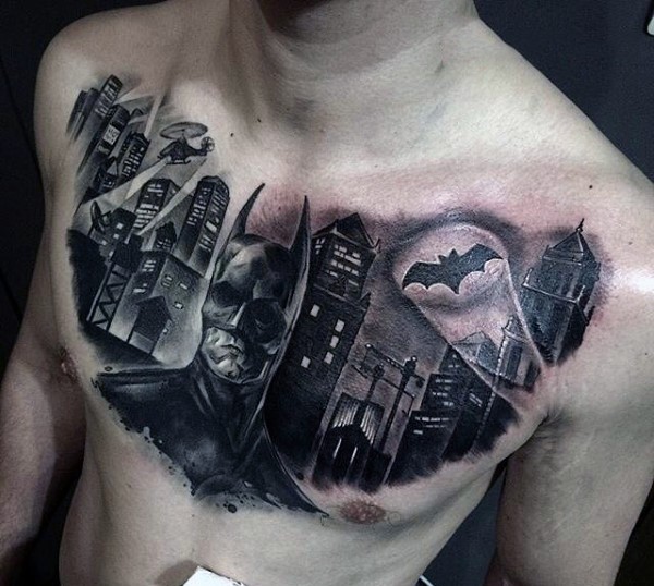 Black ink incredible looking dark Batman with city tattoo on chest