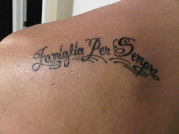 Black ink italian words tattoo