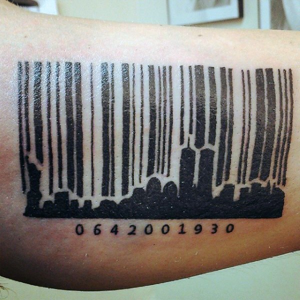 Black ink leg tattoo of city shaped barcode