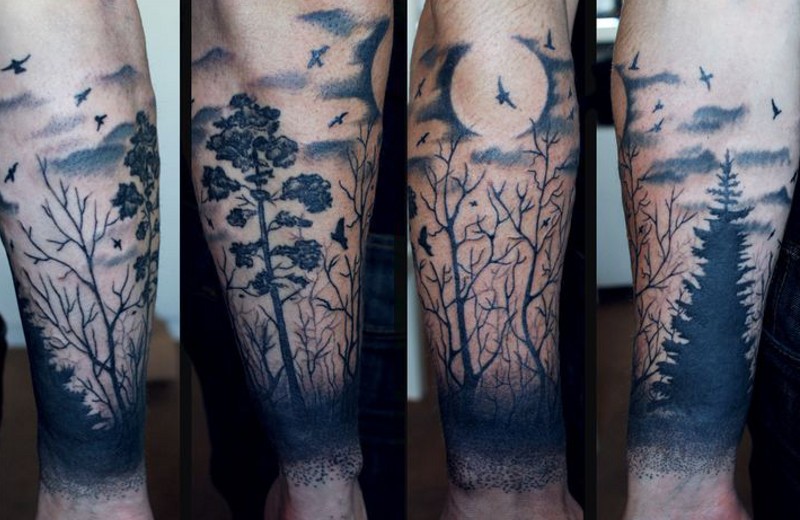 Tatuaje en el antebrazo,
luna y árboles diferentes