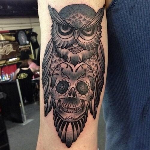 Black ink owl with sugar skull forearm tattoo