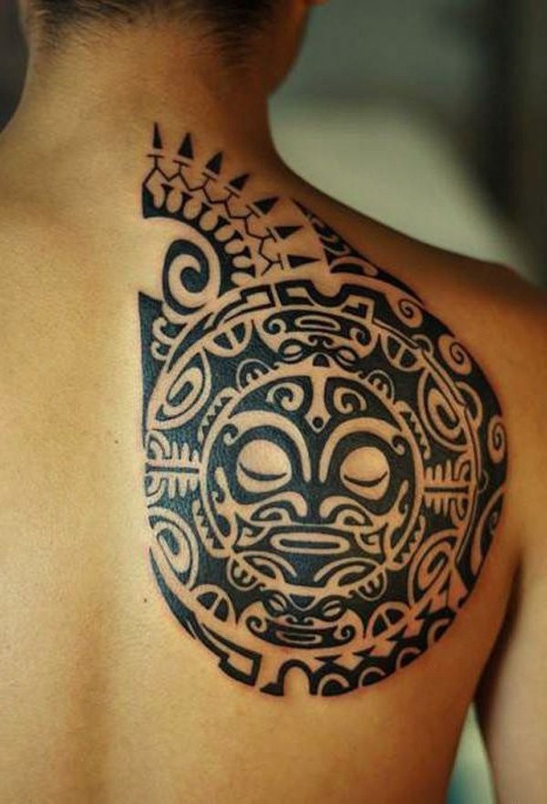 Black ink scapular tattoo of Polynesian style ornament
