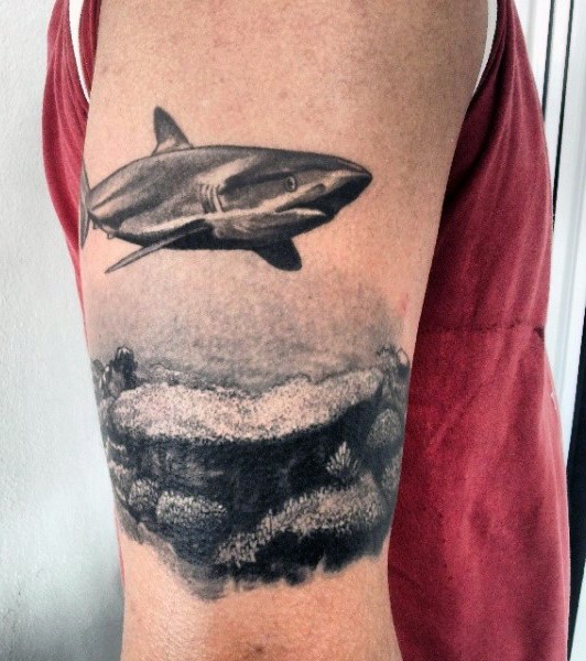 Black ink shoulder tattoo of big shark