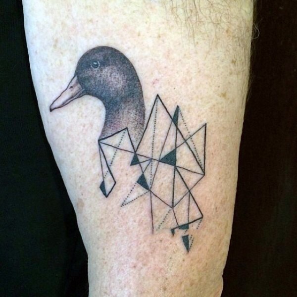 Black ink stippling style tattoo of duck with geometrical ornaments