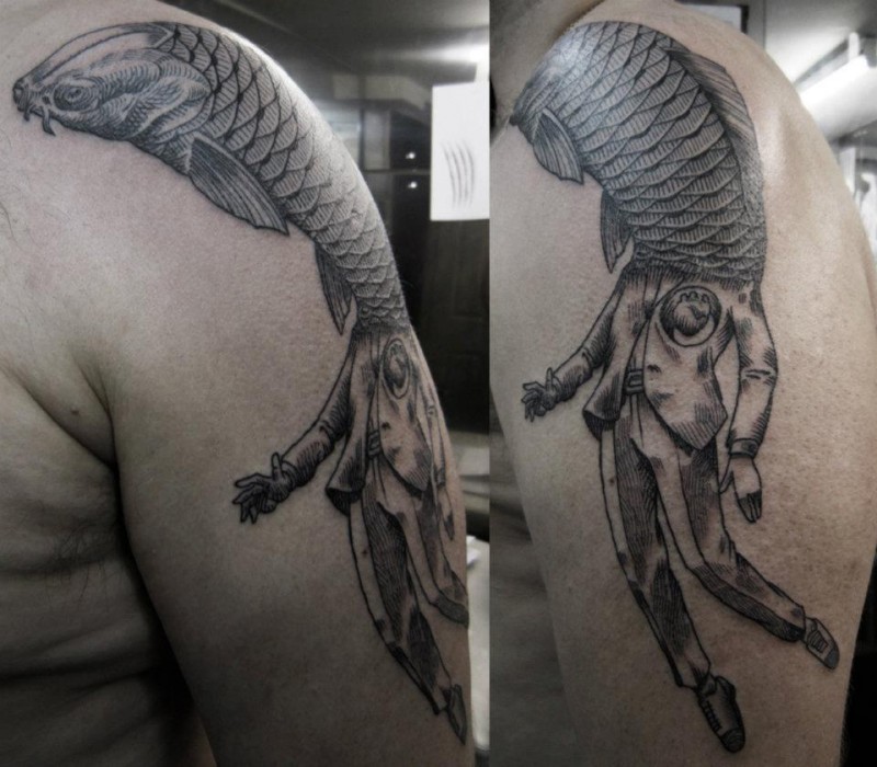 Black ink surrealism style shoulder tattoo of human body with big fish