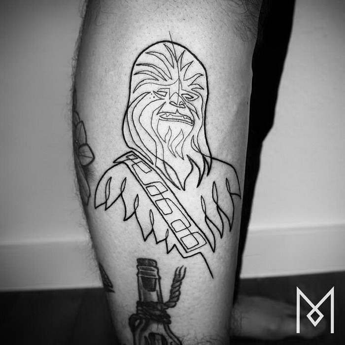 Black ink thigh tattoo of Chewbacca portrait