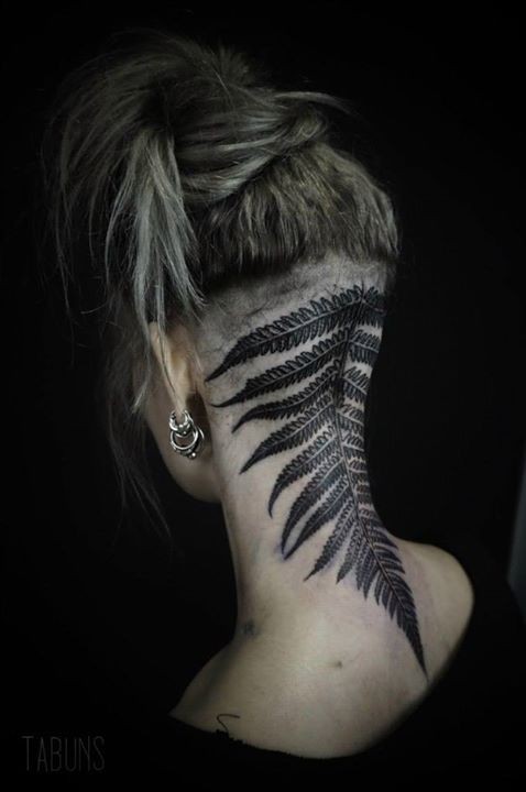 Black ink very detailed neck tattoo of fern leaf