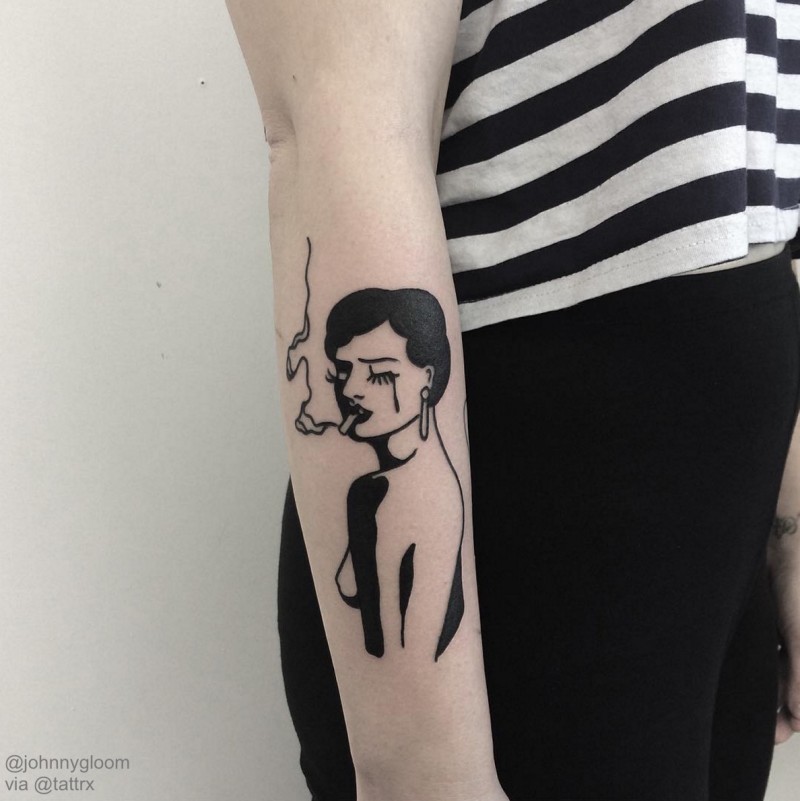 Black ink vintage looking arm tattoo of smoking woman