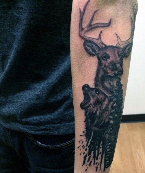 Black ink watercolor style medium size forearm tattoo of roaring bear and deer
