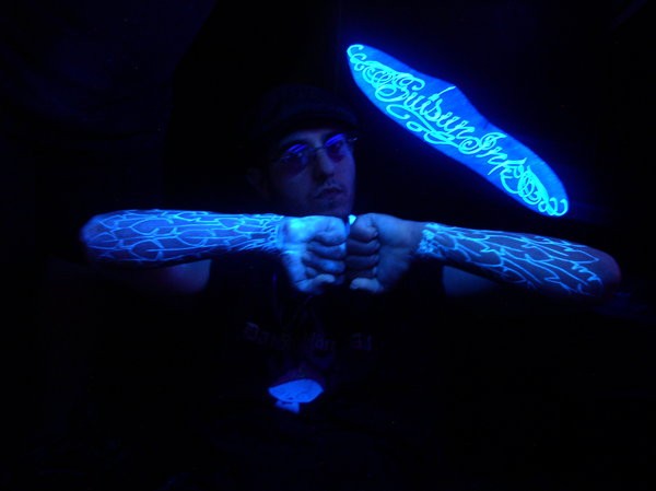 Black light glowing tattoo tec style