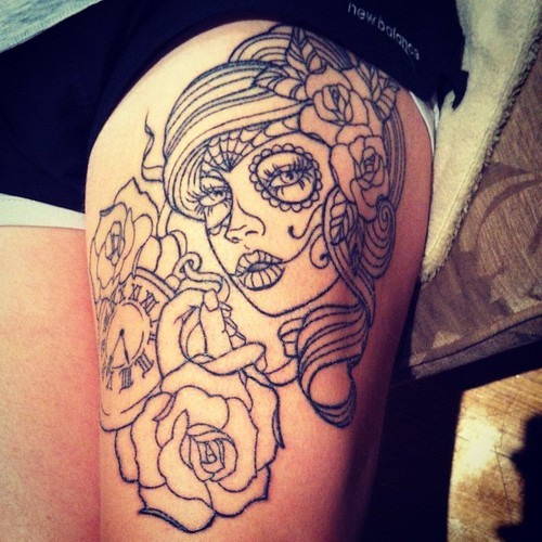 Black lines dia de los muertos tattoo on thigh