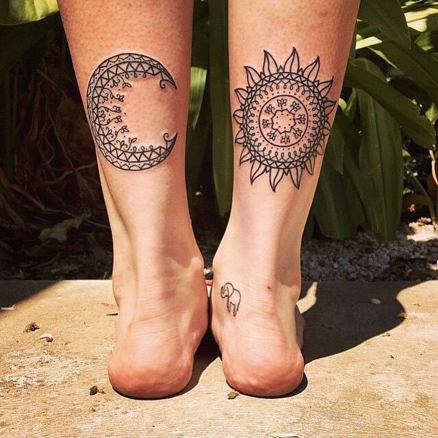 Black lines patchwork sun and moon tattoo on legs