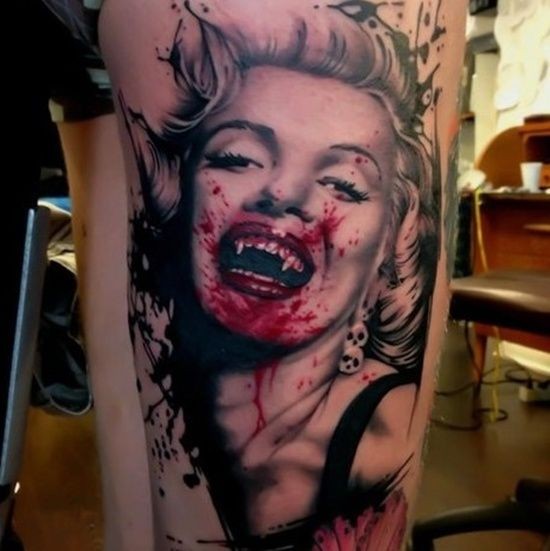 Black red bloody marilyn monroe vampiress tattoo on thigh