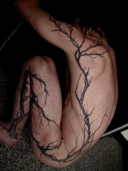 Black tree tattoo on whole body
