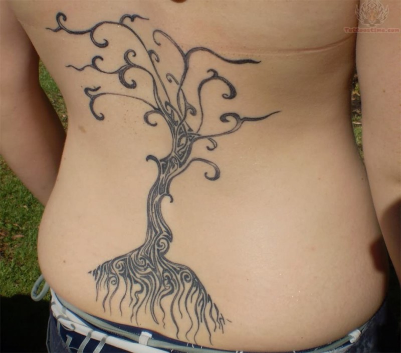 Black tribal tree tattoo