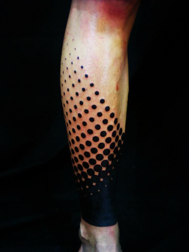 Blackwork style simple ornament tattoo on leg