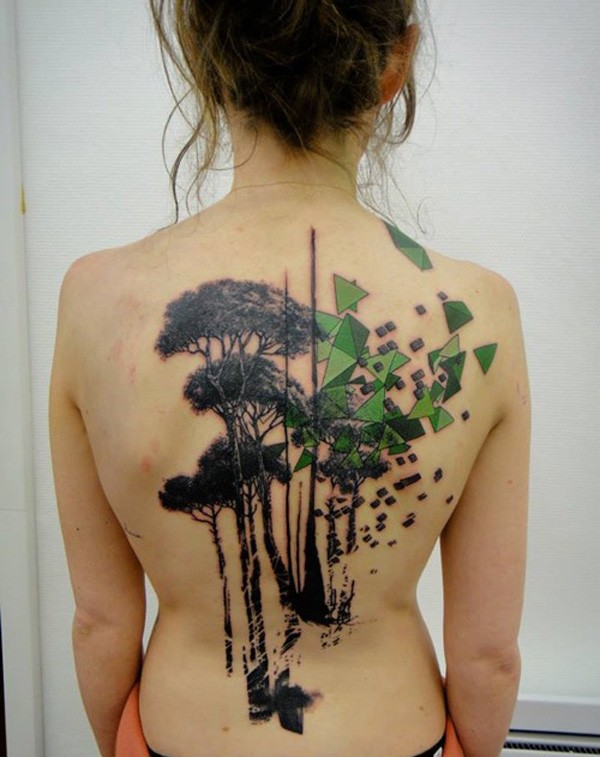 Black and green geometric tree tattoo on back