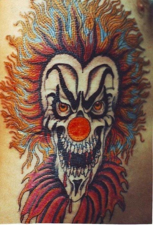 Bloodthirsty killer clown tattoo