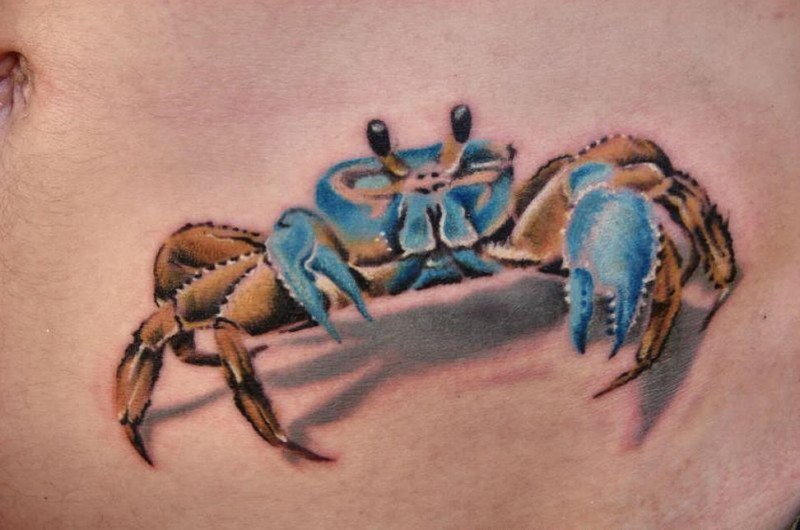 Blue 3d crab tattoo on belly