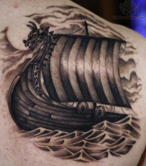 Boat of vikings tattoo on shoulder blade
