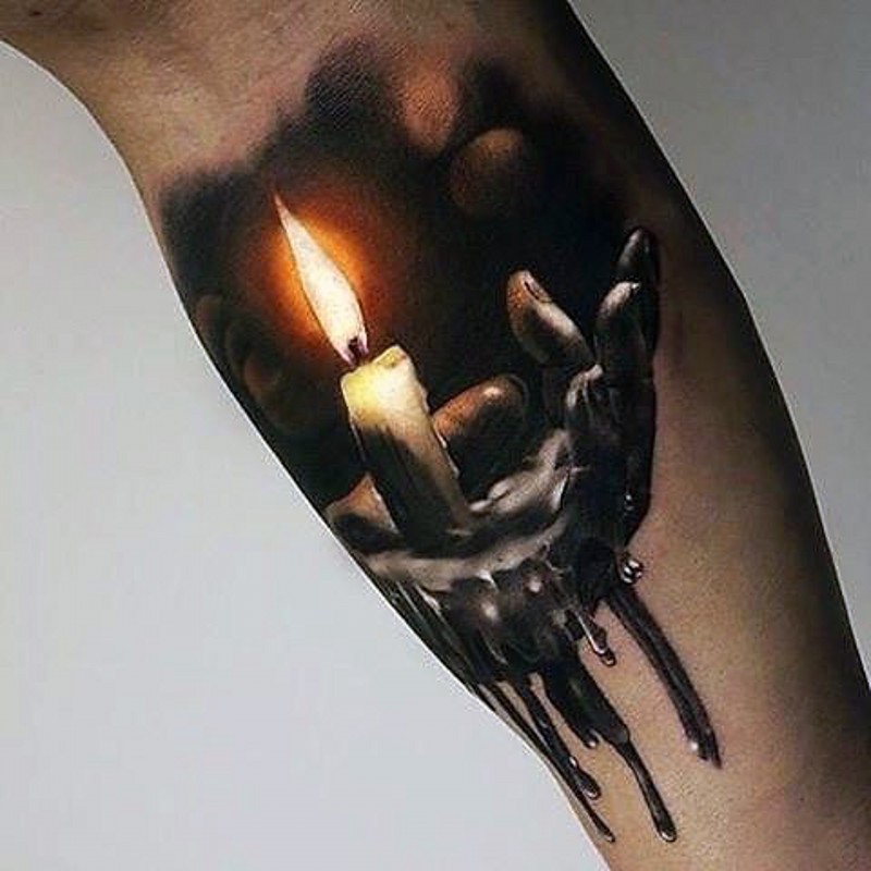 Breathtaking 3D super realistic burning candle on hand colored tattoo on arm with paint drips
