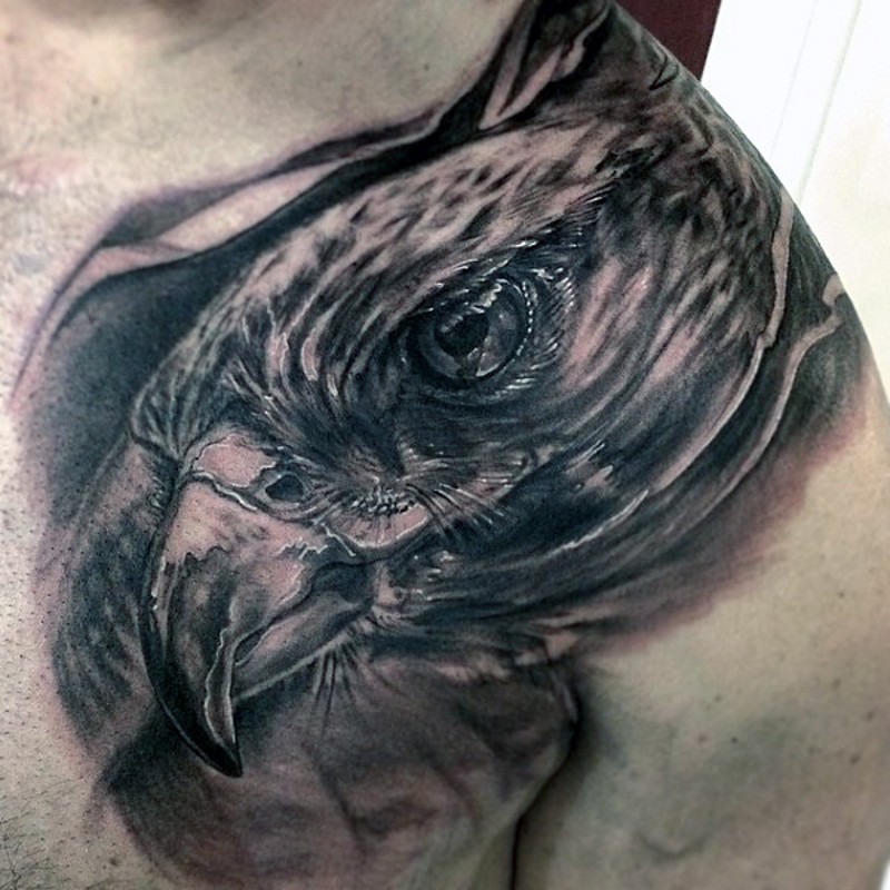 Breathtaking black and white shoulder tattoo of eagle head