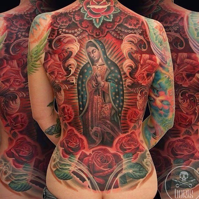Breathtaking large religious style colored whole back tattoo of praying woman and flowers