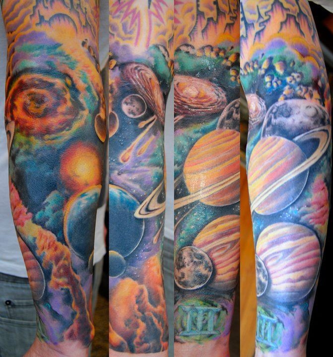 Breathtaking painted and colored massive solar system sleeve tattoo