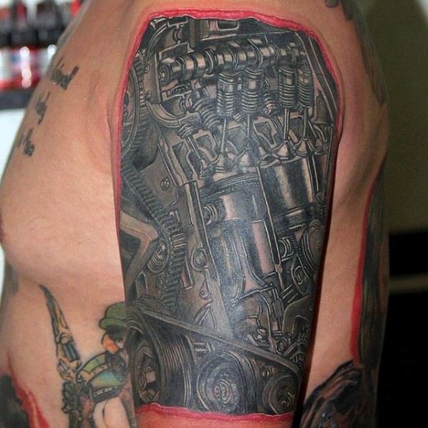 Breathtaking realism style very detailed sampled engine tattoo on shoulder