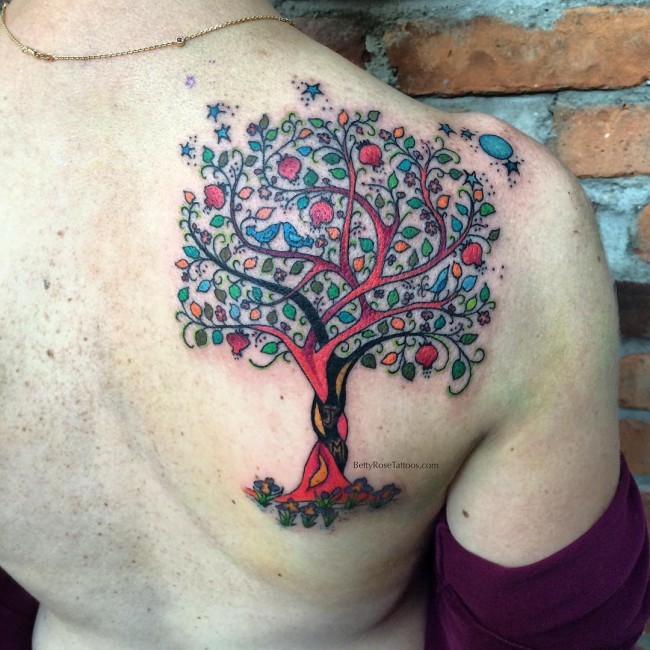 Breathtaking very beautiful looking colored fantasy tree tattoo on shoulder with stars and moon