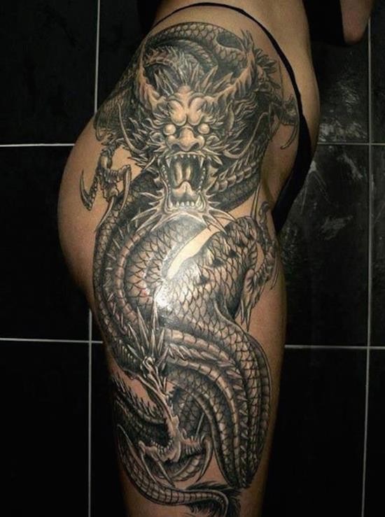 Breathtaking very detailed black and white Asian style dragon tattoo on thigh