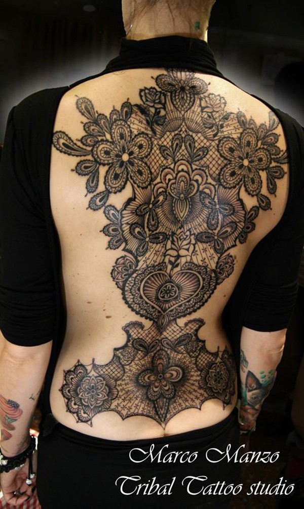 Breathtaking very detailed floral tattoo stylized with different ornaments tattoo on whole back