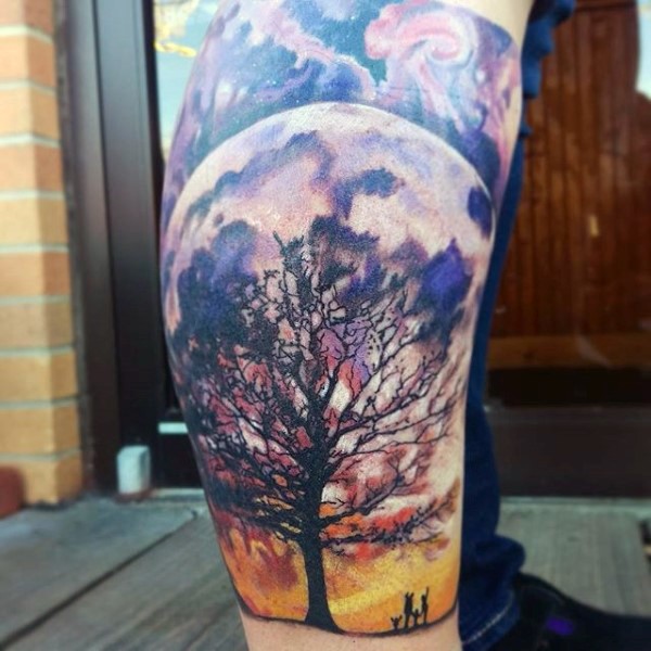 Brilliant designed and colored massive lonely tree with family and big moon tattoo on leg
