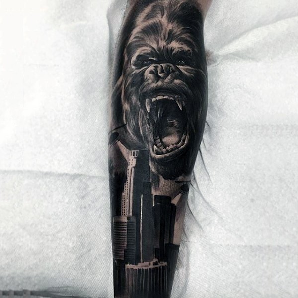 Brilliant detailed and colored angry Gorilla with city tattoo