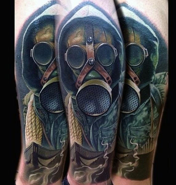 Brilliant multicolored sleeve tattoo of very detailed man in gas mask