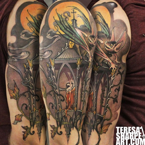 Brilliant painted colored shoulder tattoo of old candle street lighter with vampire bat