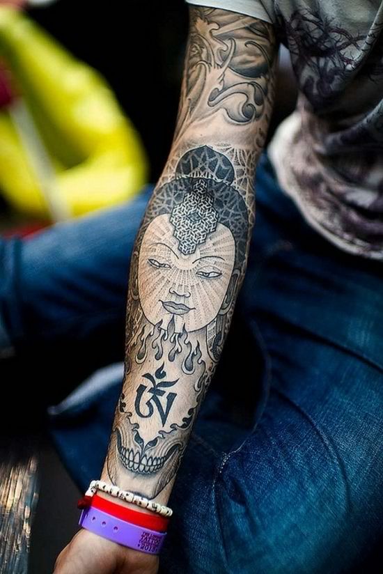Buddhist style tattoo on arm