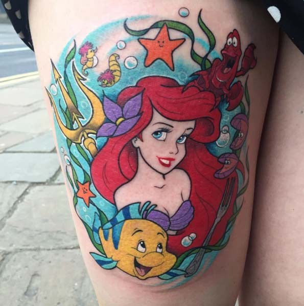 Cartoon Ariel mermaid and heroes multicolored thigh tattoo with sea bottom scene