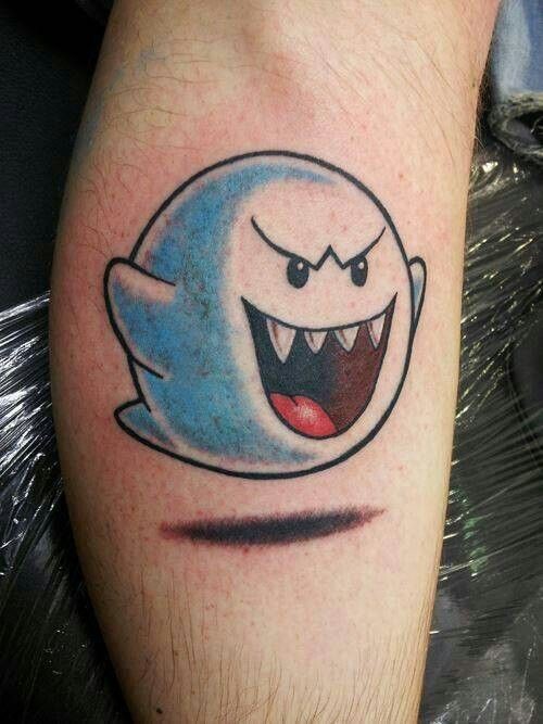 Cartoon blue ghost tattoo for man idea