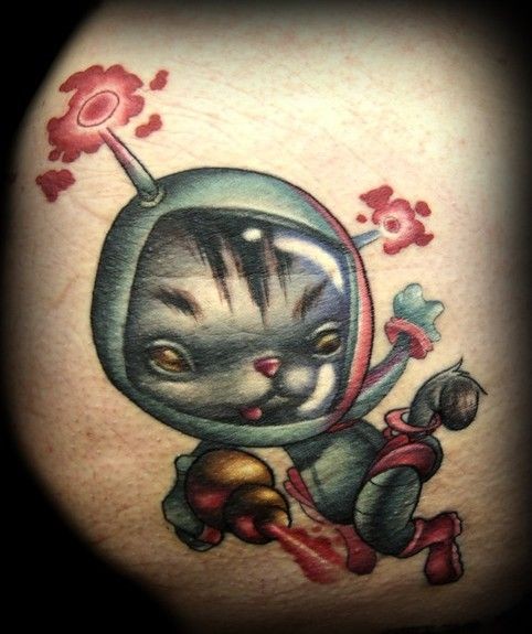 Cartoon futuristic style colored thigh tattoo of space cat with blaster pistol