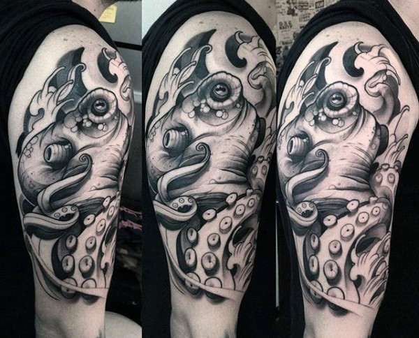 Cartoon like black and white detailed octopus tattoo on shoulder