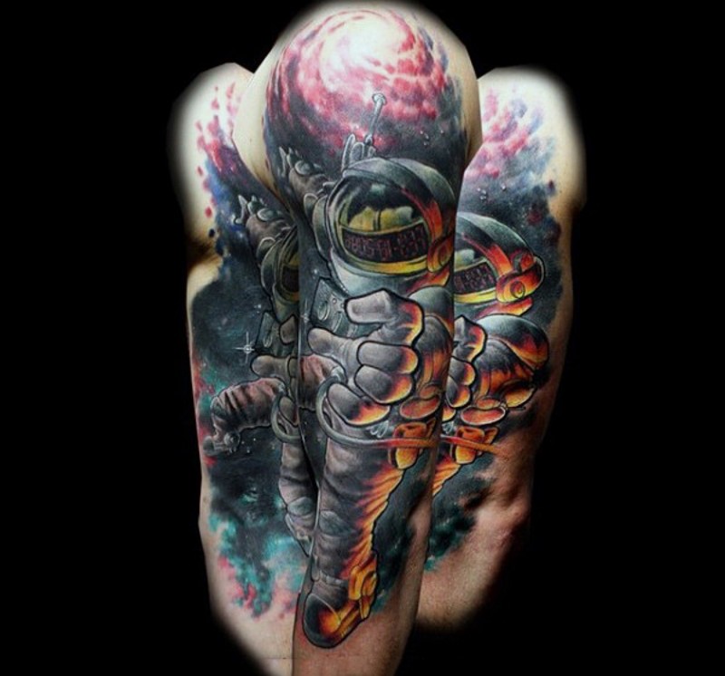 Cartoon like colored space man tattoo on sleeve