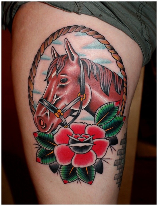 Cartoon like colored sweet horse tattoo on thigh with flower