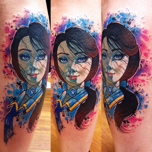 Cartoon like colored woman portrait tattoo on leg