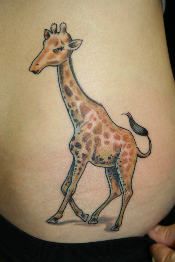 Cartoon pretty giraffe tattoo for lady